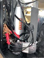 Top view of compressor body, cables and clamps