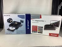 Photo of the full boxed Sony VRD-MC10 DVD recorder and Kworld external ATSC TV Box