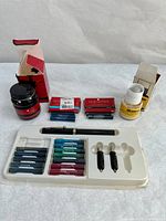 Full view of calligraphy set with pen, colorful ink cartridges, Sheaffer ink bottles and fountain pen inserts.