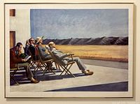 Full view of the framed print showing five people seated on a terrace looking at distant mountains, under a clear blue sky.