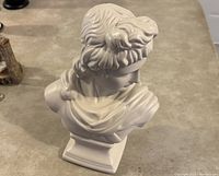 Front top angle view showing detailed hair and shoulders