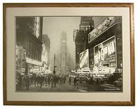 Full view of black and white Times Square 1942 image in wooden frame with white matting.