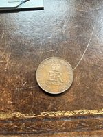 Reverse side of the coin featuring crowned 'ER' cypher with inscription "CORONATION JUNE 2nd 1953" around the edge.