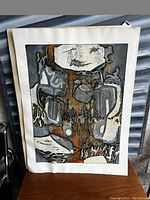 Photo showing the full print from a slight angle, illustrating color composition and condition.
