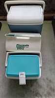 Three coolers stacked: Large Igloo cooler on top, medium Playmate Ultra in middle, and small unmarked cooler on bottom.