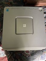 Full top view of the air purifier unit showing design and condition.