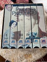 Boxed six-part VHS series of Jane Austen's Pride and Prejudice including volumes I to VI in original A&E Home Video cases.
