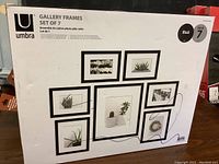 Box of Umbra Gallery Frames set of 7 showing product image and brand
