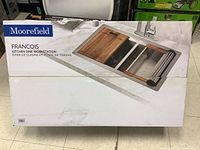 Box front showing Moorefield Francois Kitchen Sink Workstation packaging