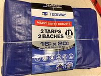 Packaged set of two Toolway heavy duty tarps measuring 16 ft x 20 ft each, 10 mil thick, labeled heavy duty and reversible.