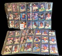 Binder pages with multiple baseball cards displayed, showing various players from the 1986 Leaf Donruss set.