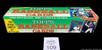 Closed original Topps Baseball Cards box with 1990 Official Complete Set labeling and player card images on the side