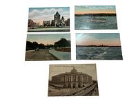 Five postcards laid out on a flat white surface showing front views and various Boston-related scenes.