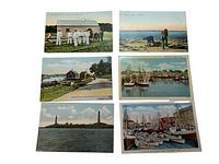 Group shot of all 6 postcards laid out showing all views and subjects