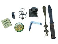 Top-down view of the vintage small collectibles lot on a white background showing all items.