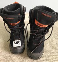 Front view of pair of WindRiver TrueForm boots size 8 with black synthetic upper and orange details
