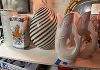 Overview of all items: two ceramic vases, glass swirl vase, pair of fish pitchers