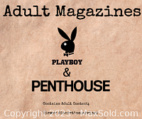 Close-up of Playboy and Penthouse adult magazine text cover