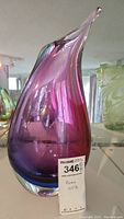 Full view of the purple gradient Murano glass vase showing the elegant curved shape and spout.
