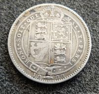 Obverse side showing 1888 date and royal coat of arms with the motto inscription