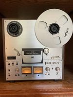 Front view of Akai deck loaded with TDK reel spool