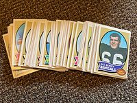 Spread of assorted football cards including Bill Bergey Cincinnati Bengals