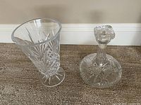 Wide view showing both crystal vase and decanter with stopper