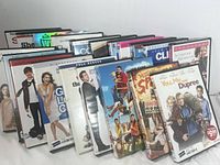 20 Comedy and Romantic Comedy DVDs arranged in two rows showing spines and covers