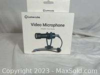 Front of the sealed Lume Cube Video Microphone retail box showing product image and branding