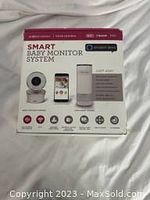 Box front showing Project Nursery Smart Baby Monitor System, two main device components pictured, text describing features and compatibility.