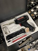 Electric soldering gun and accessories in fitted plastic case