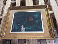 Framed linocut print 'Girl in the Jungle' showing full frame and matting with some wear on frame edges.