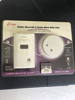 Kidde branded value pack containing carbon monoxide alarm and smoke alarm, box displaying both devices and included batteries.