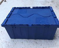 Closed view of the dark blue plastic storage container showing the integrated hinged lid and external reinforcement ribs.