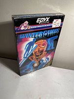 Front view of the sealed Winter Games Atari 2600 cartridge box with Epyx branding and price sticker.