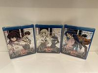 Three Blu-ray cases of Kurokami The Animation volumes 1 to 3 in a row showing front cover anime artwork under shrink wrap.