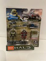Original packaged set showing Master Chief and Brute Warrior figures each with weapons and a display block.