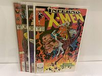 Front view of the four X-Men Inferno comics, showing colorful covers and Marvel branding.