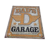 Front view of 2013 Dad's Garage tin sign with vintage design and text.