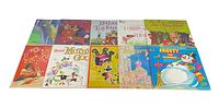 Initial overview of 10 assorted children's albums arranged in two rows showing colorful illustrated covers with various themes.