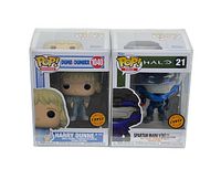 Front view of two Funko Pop Chase exclusive figures: Harry Dunne #1040 from Dumb and Dumber and Spartan Mark V #21 from Halo, each in original box and clear protective case.