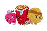 Front view of three Shopkins plush collected including pink milk carton, red French fries, and cheeseburger with headband along with Shopkins card