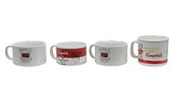 Set of four Campbell's Soup collectible ceramic bowls showing varied classic advertising designs, viewed from side.