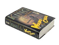Outer cover view of Stephen King's "Wolves of the Calla" hardcover book from The Dark Tower series. Shows spine and front cover artwork.