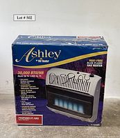 Front of sealed box showing Ashley by Mr. Heater vent-free blue flame gas heater, 30,000 BTU/hr, heats up to 1,000 sq ft