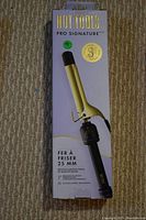 Photo of the Hot Tools Pro Signature Curling Iron box featuring image, brand, and barrel size information.