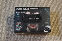 Photo of Utopia 360 Virtual Reality 3D headset box showing branding, Bluetooth controller inclusion, and compatibility with smartphone apps
