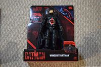 Photo of Wingsuit Batman action figure in original packaging showing figure and branding