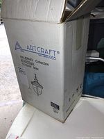 Original box of the Artcraft Palermo hanging lamp showing product name, model AC8025MA, and design illustration.