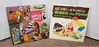 Two vintage Walt Disney vinyl record albums side by side on a white background with signs of wear visible on covers.